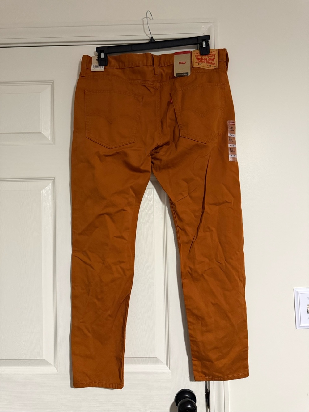 Levi's Men's Slim tapered Jeans in Rust Orange